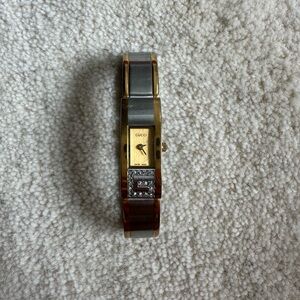 Gucci gold and silver watch